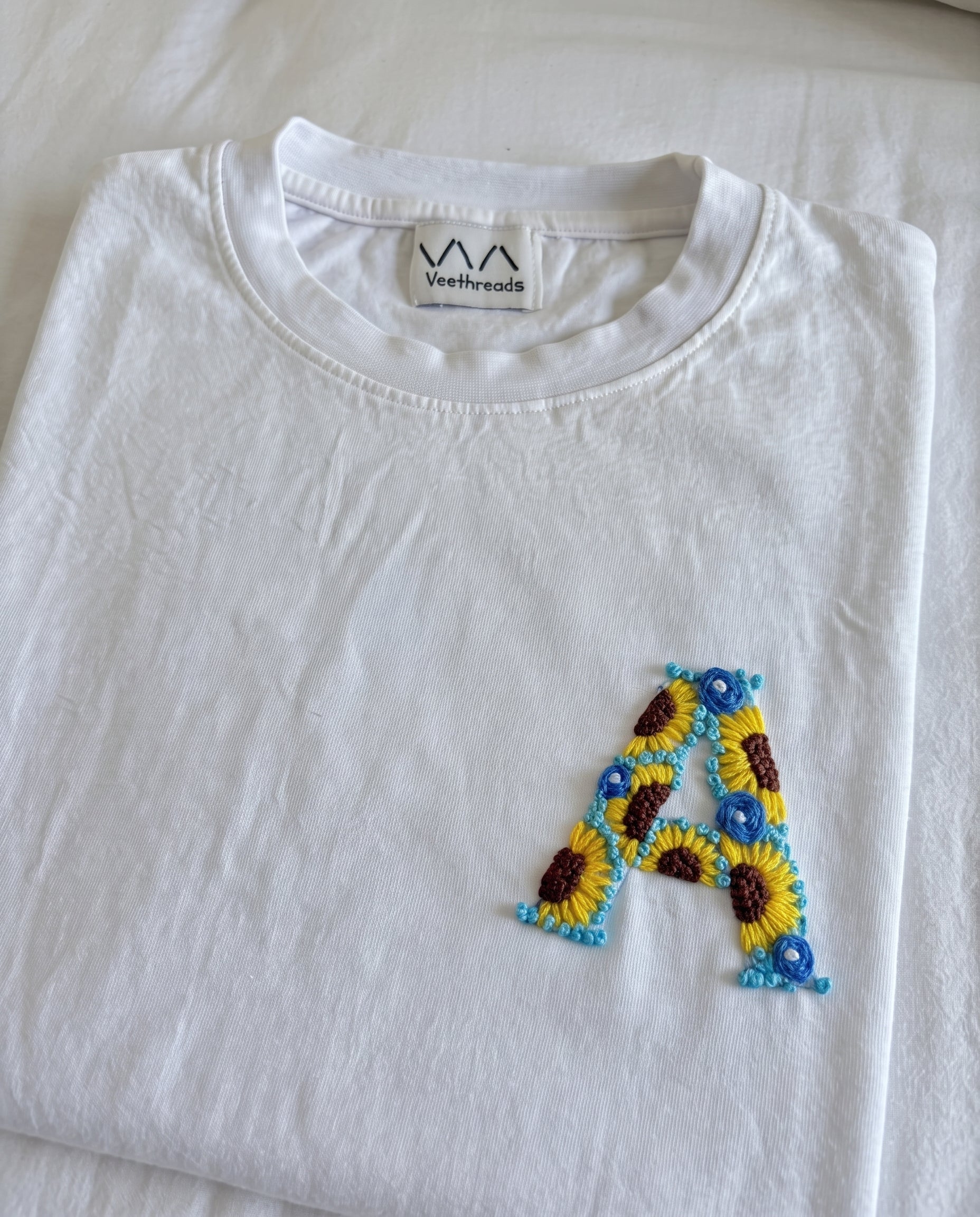 Hand-embroidered personalised gifts for Diwali corporate gifting by Vee Threads