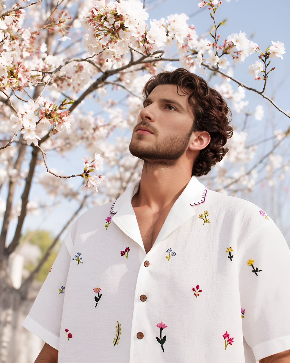 Hand embroidery designs for men's shirts - mixed flowers stitched across the chest of a cotton shirt