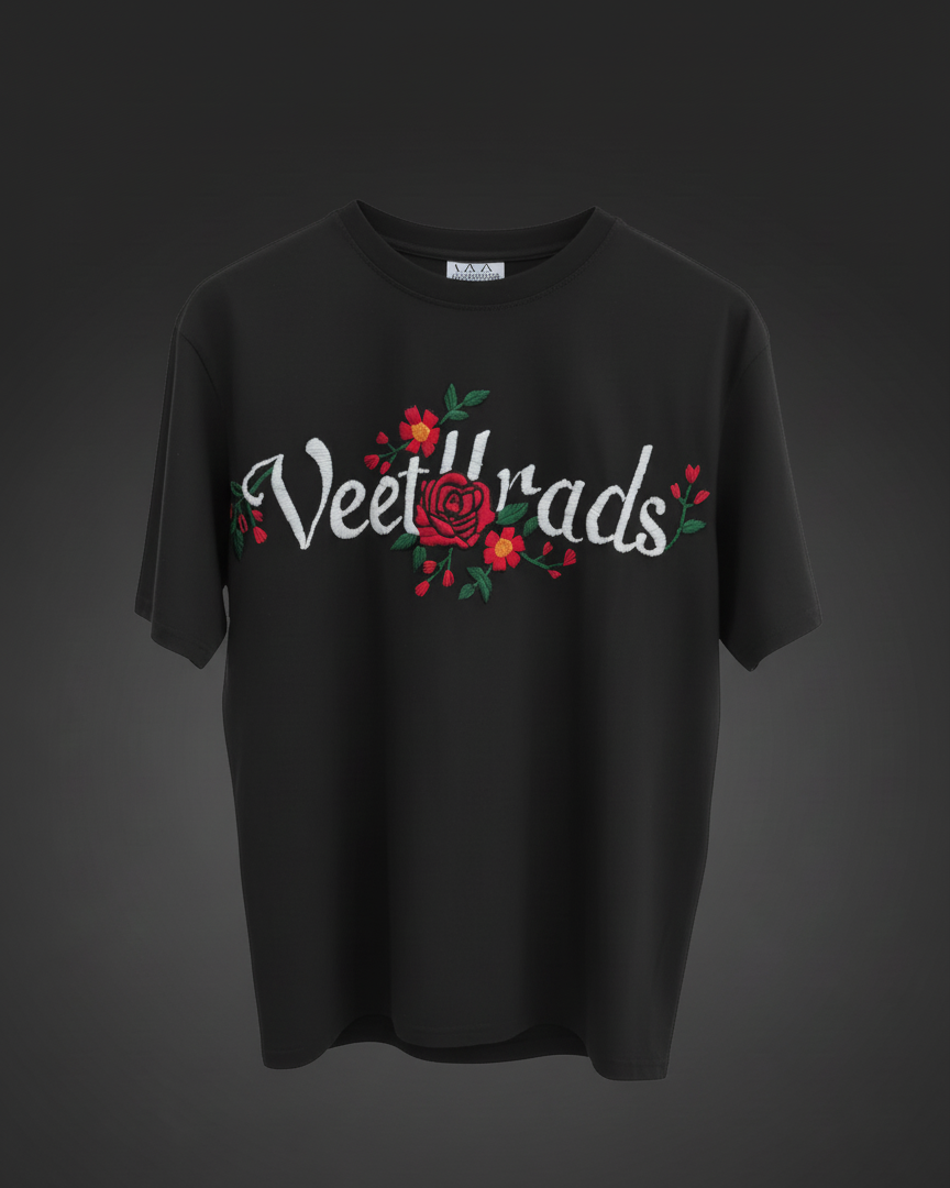 Black t-shirt with 'Veetbrads' text and floral design on a dark background