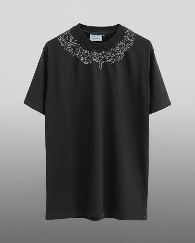 Black t-shirt with embroidered collar on a gray background