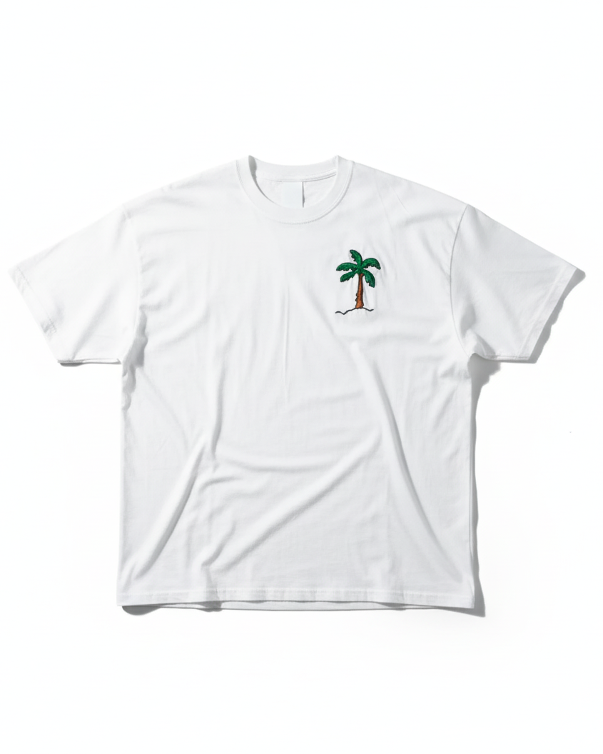 flatlay of palm tree hand embroidered oversized t-shirt 220 gsm cotton