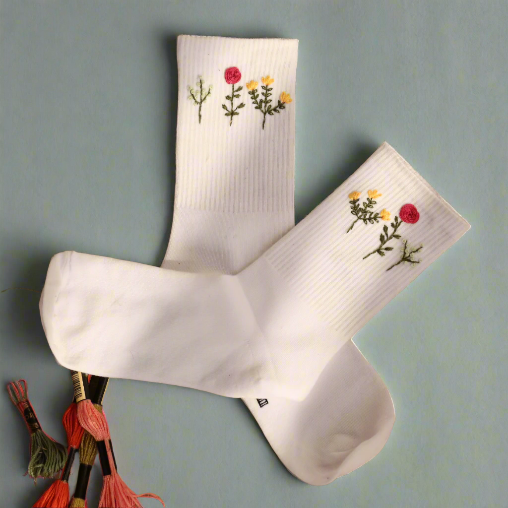 Close-up of embroidered socks featuring delicate flower bouquet design