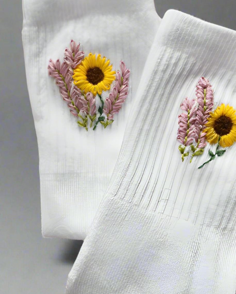 Embroidered socks sunflower lavender design — pair of white socks with hand-embroidery designs featuring sunflowers and lavender