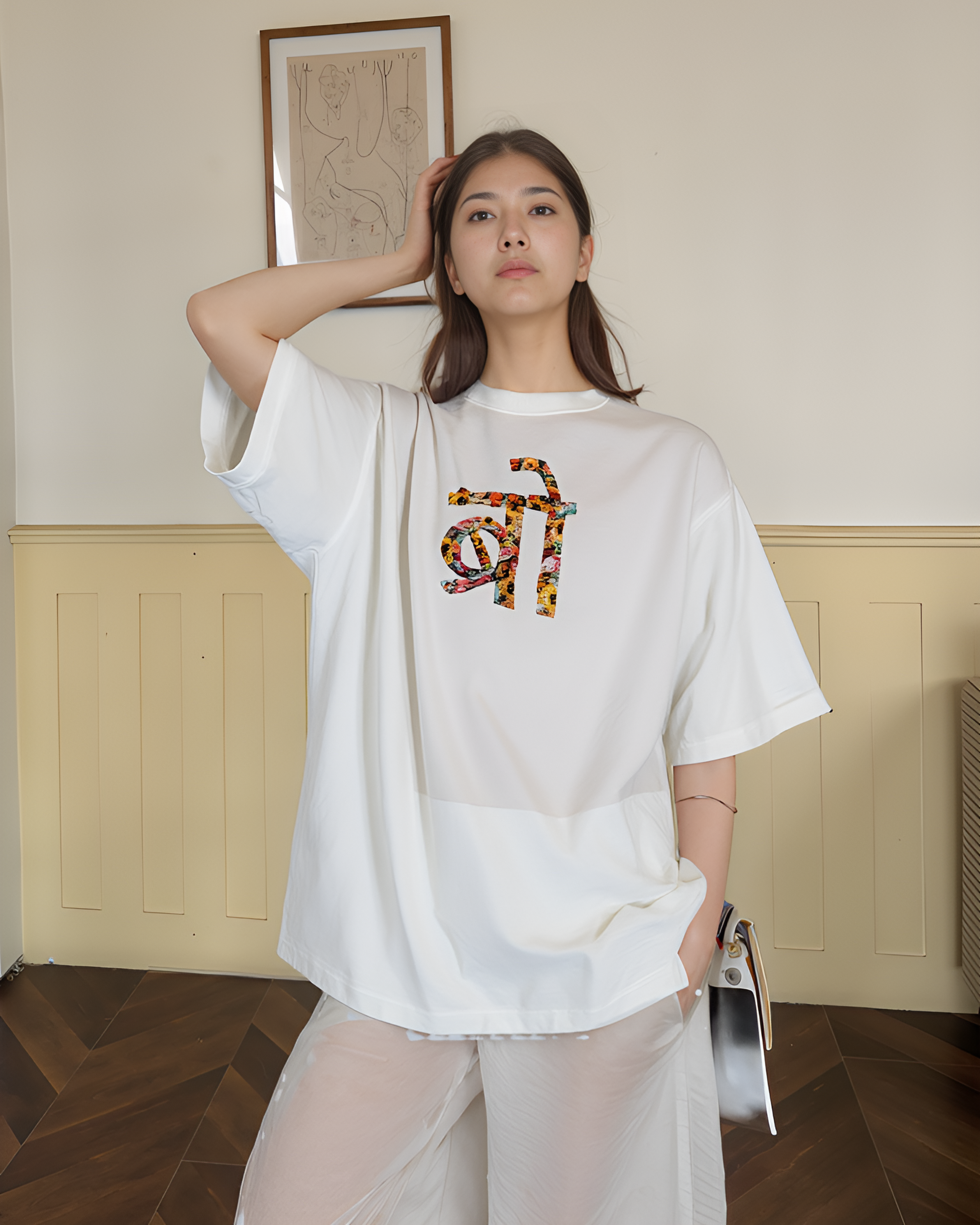 Hand embroidered tee BRO friendship gift — close-up of 'BRO' hand-embroidered on cream cotton tee, real thread artisan work