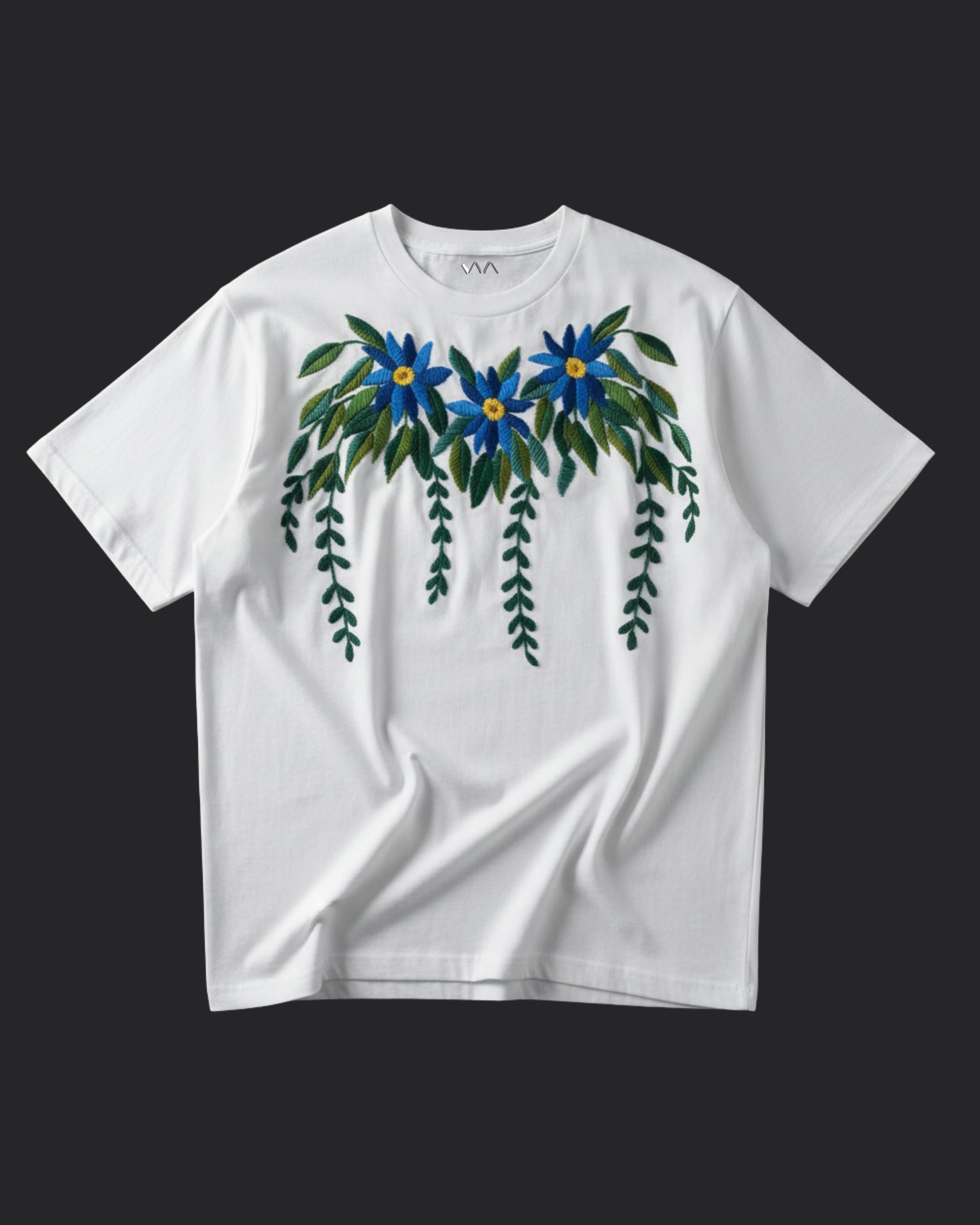 White t-shirt with hand embroidered floral design on a black background