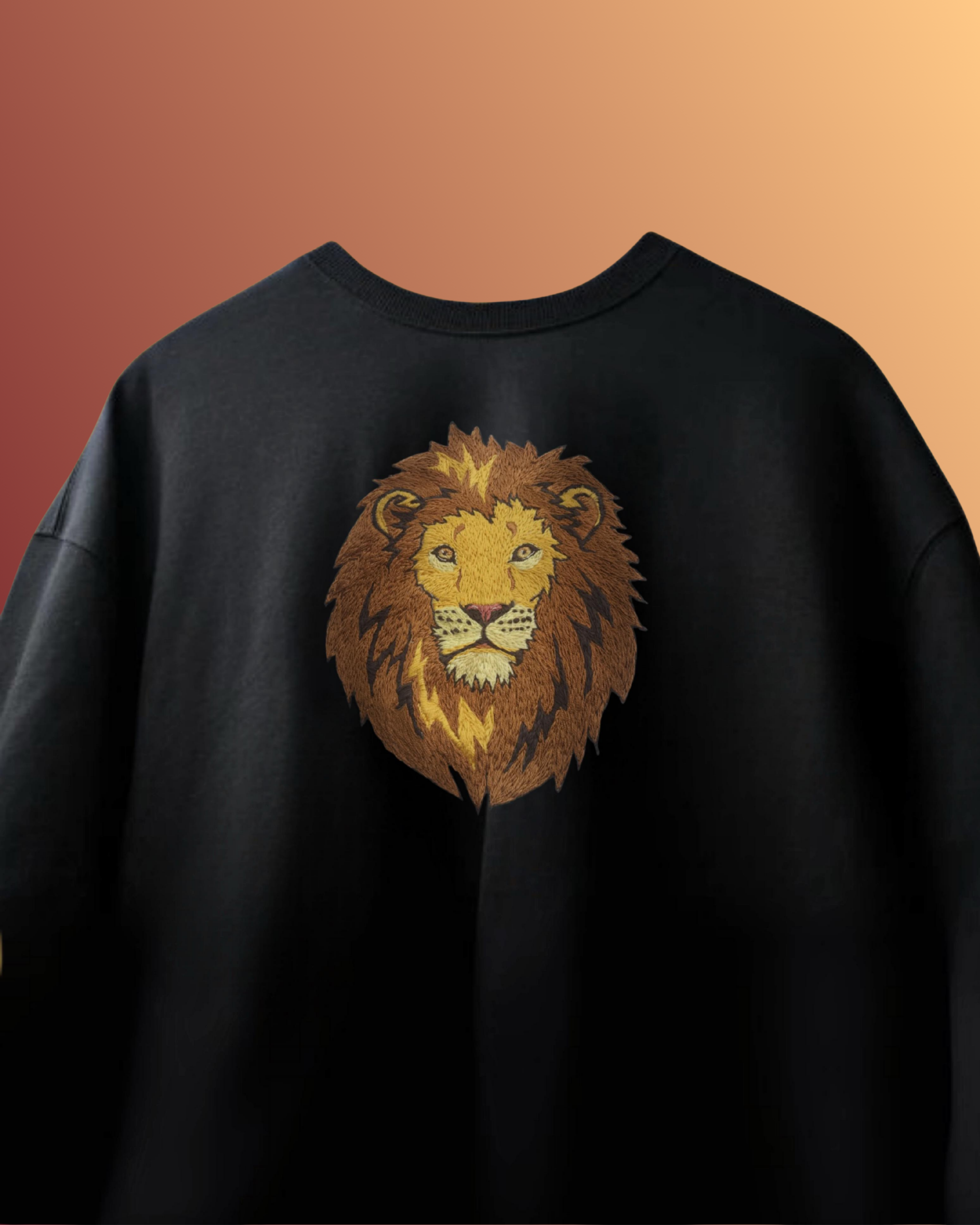 Top-view of heavyweight cotton t-shirt with bold lion embroidery, showcasing premium handwork and oversized silhouette.