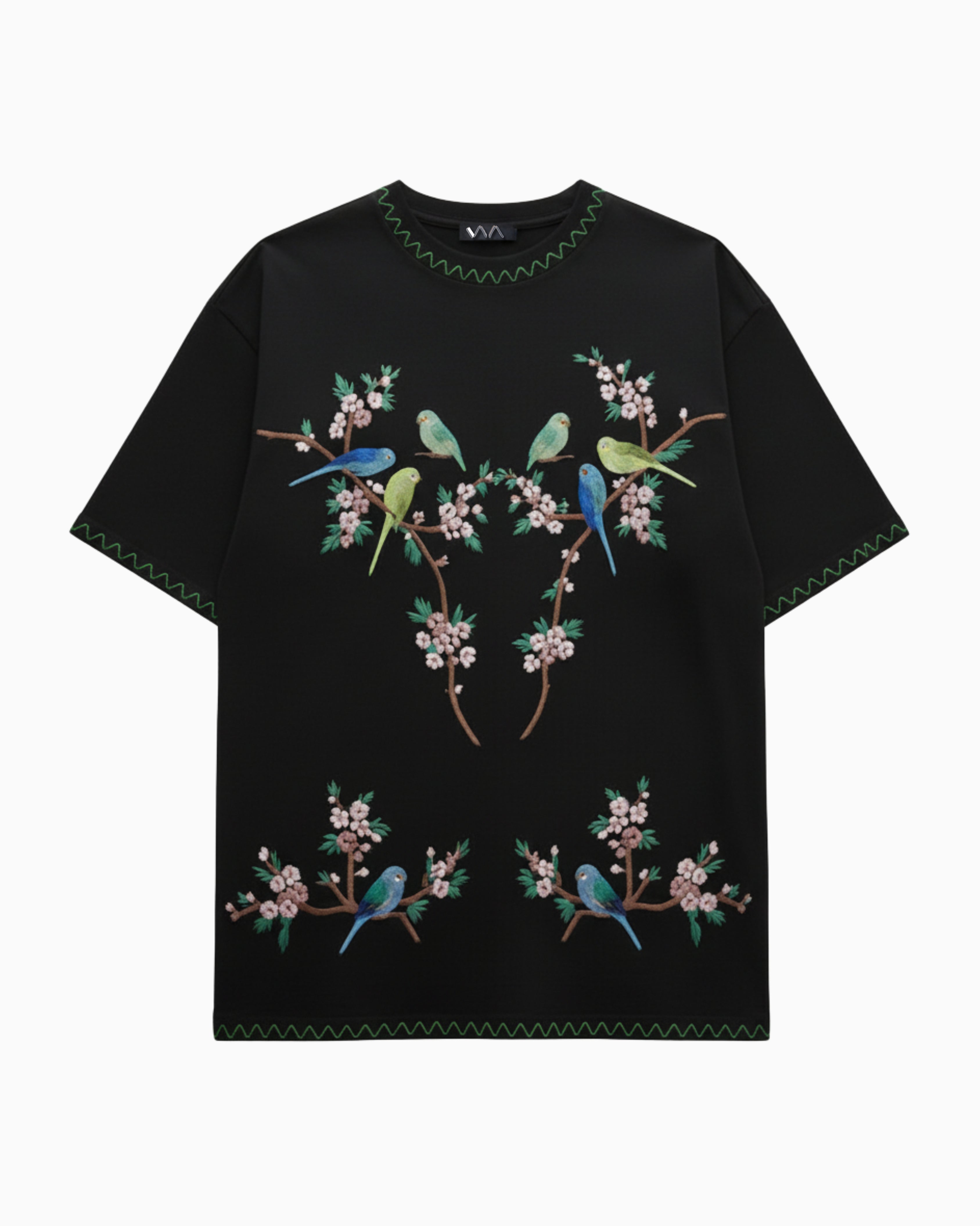 Black t-shirt with colorful bird and floral embroidery on a white background