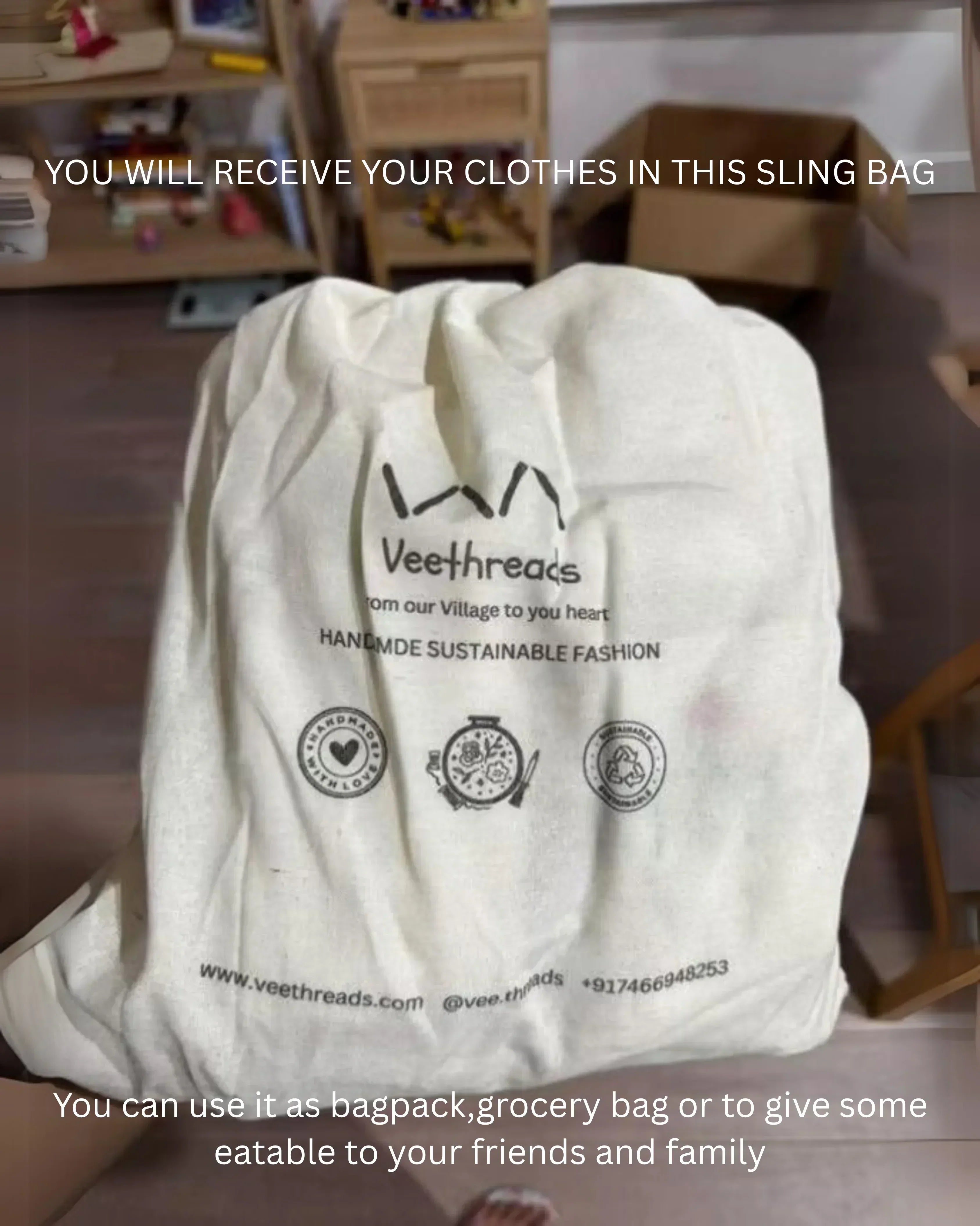 White sling bag with 'Veethreads' branding on a wooden floor.