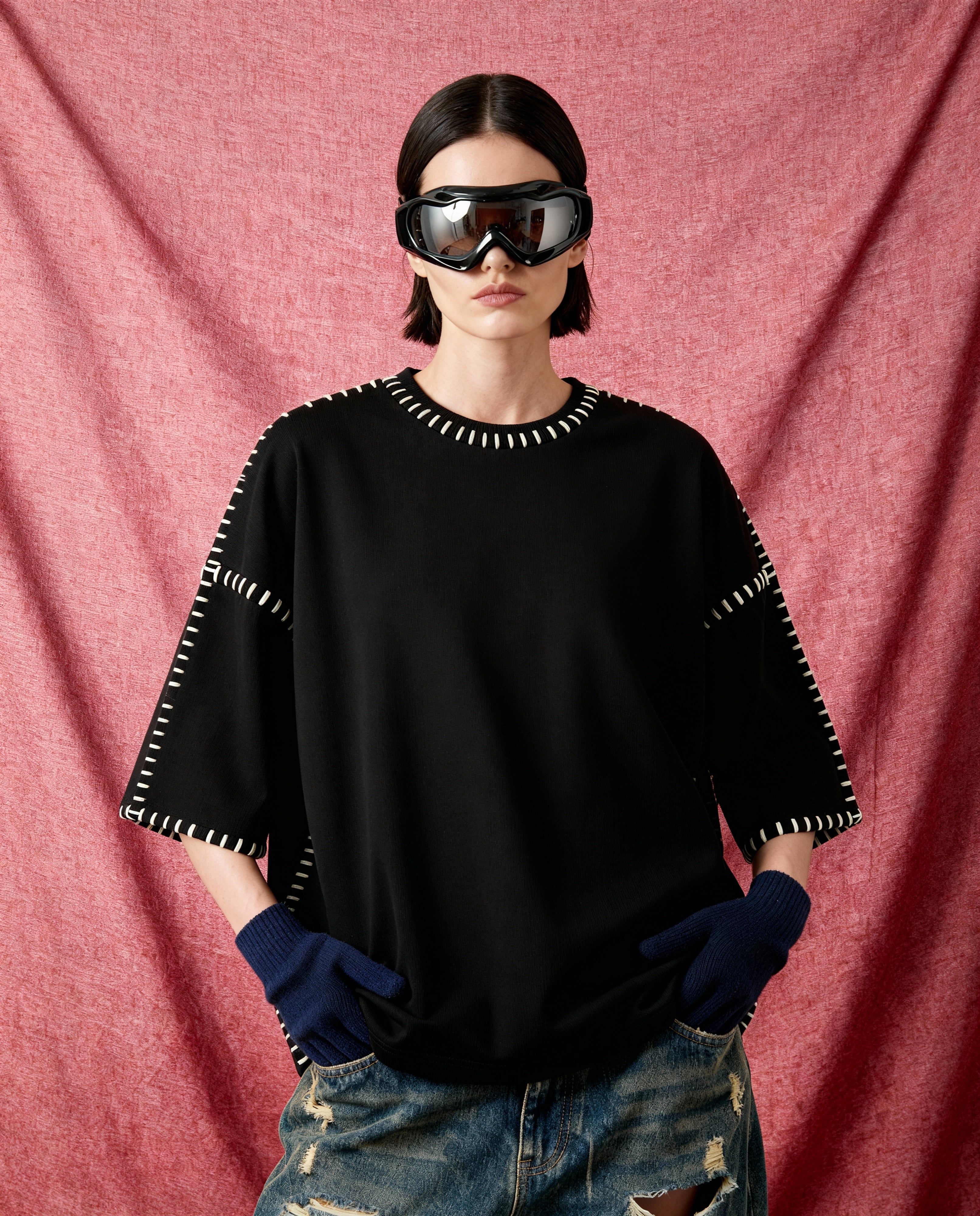 The Artisan Edge — black oversized cotton tee with white contrast-stitch line detailing, real thread, oversized unisex fit.