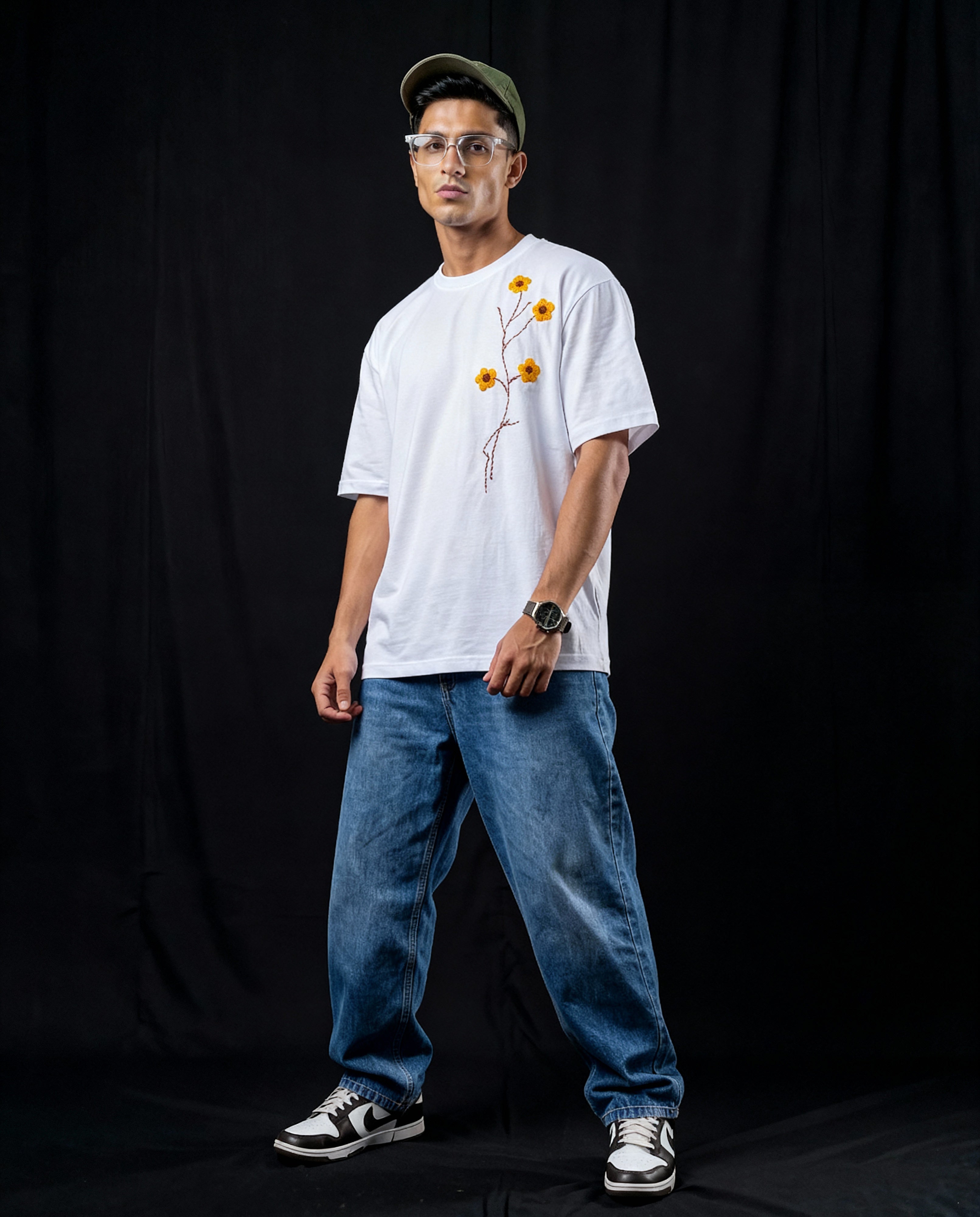 Yellow floral embroidered tee — white cotton tee with hand-stitched yellow flowers and vines on chest, premium 220 GSM