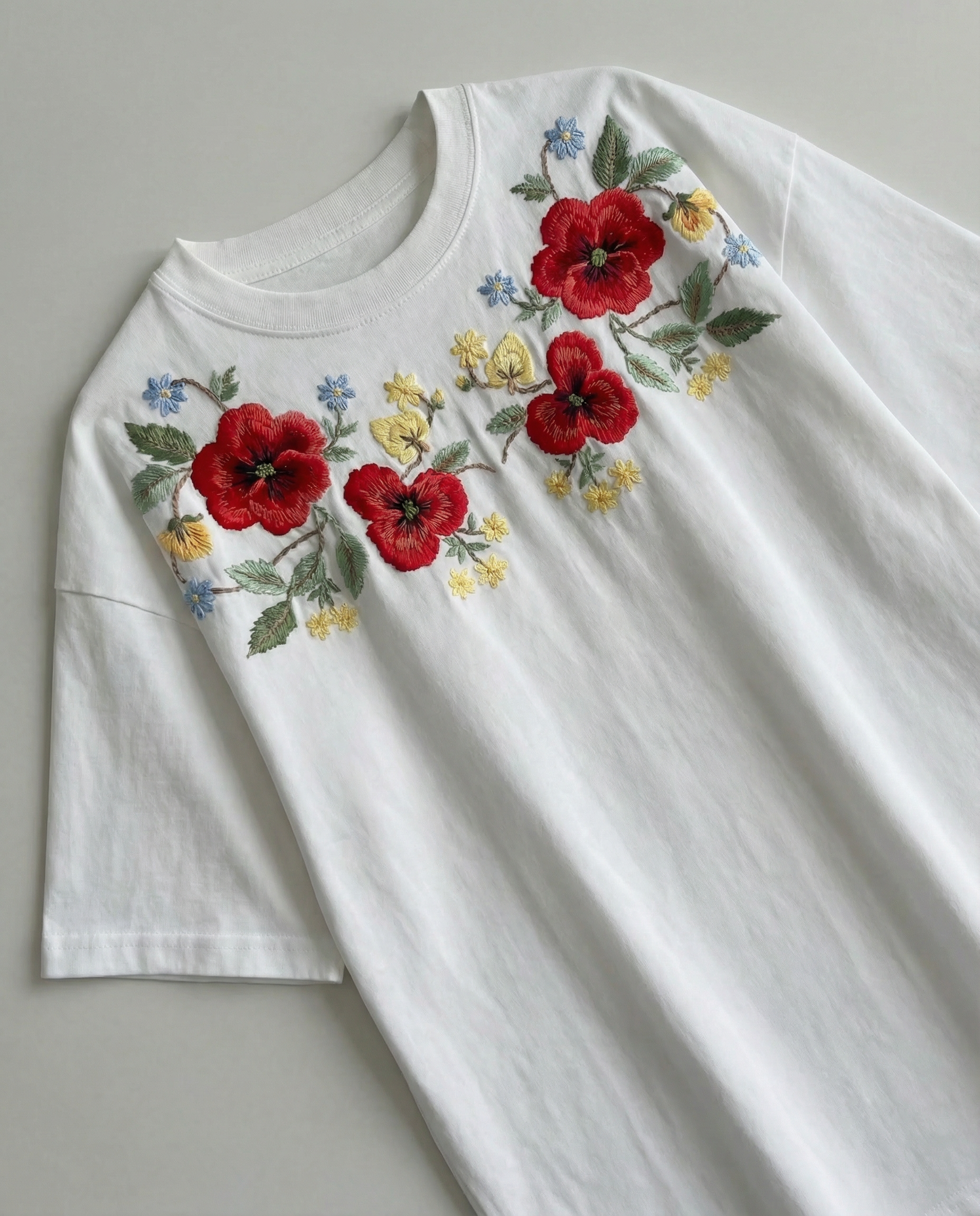 Hand embroidered floral embroidery tshirt with red poppy flowers and green vines