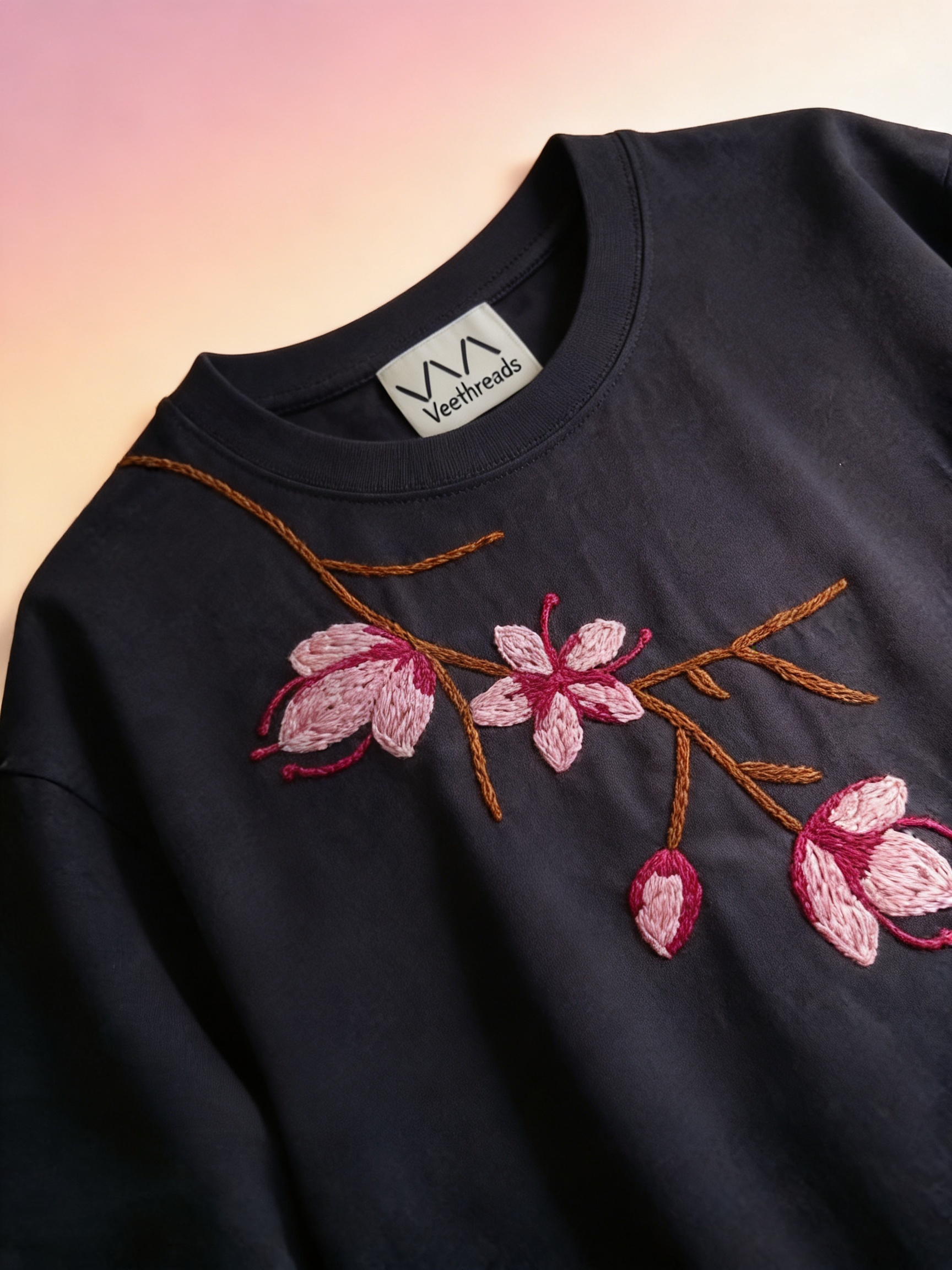 oversized hand-embroidered t-shirt with cherry blossom motif — artisan-made slow fashion by Vee Threads India