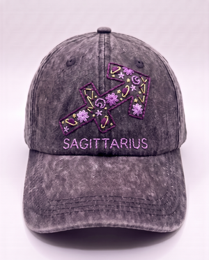 Sagittarius zodiac cap, purple arrow glyph hand-embroidered on charcoal acid-wash denim