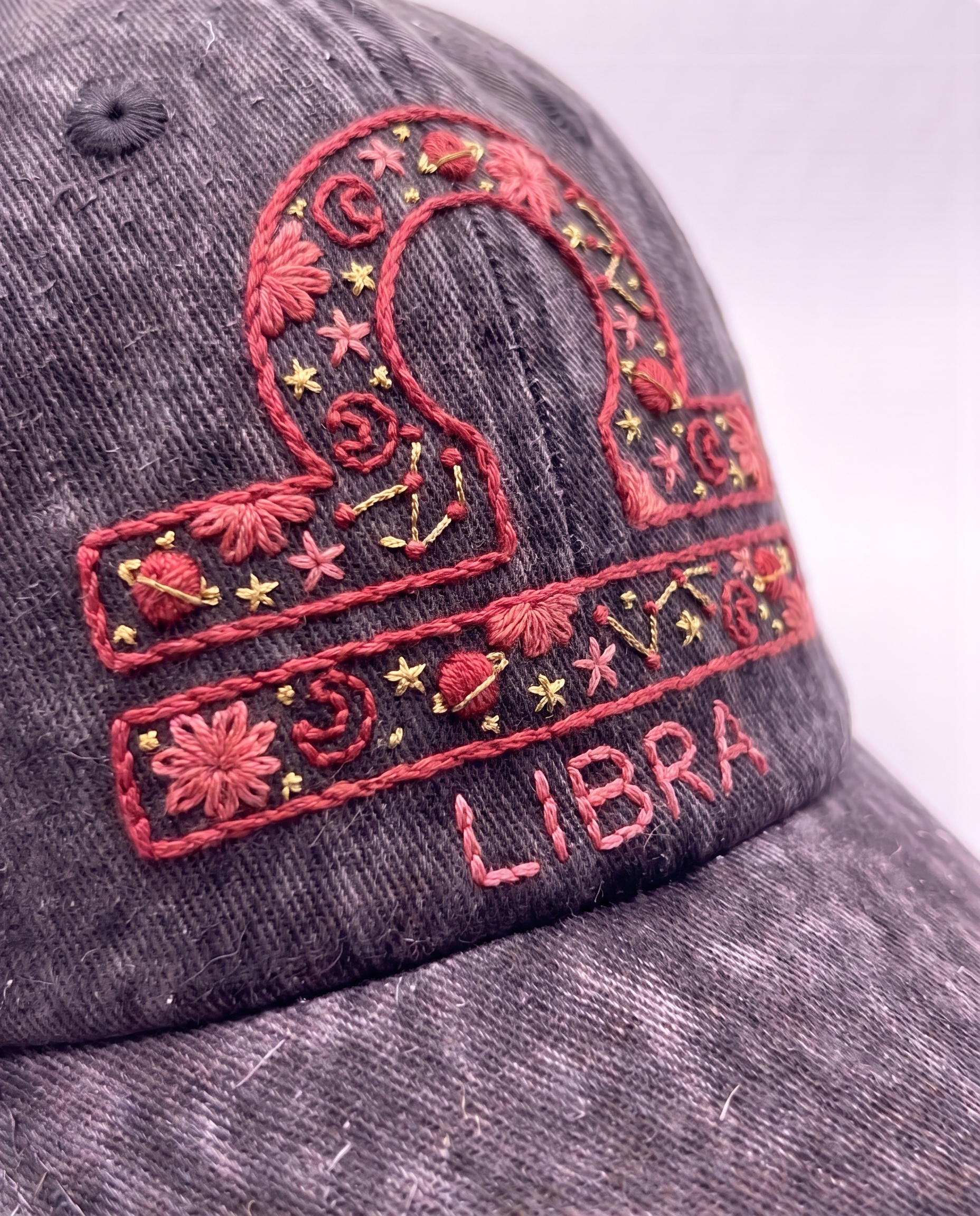 Libra zodiac embroidered cap by Vee Threads, coral and blush pink thread on washed denim