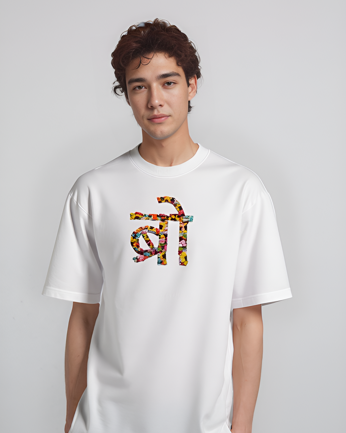 Rakhi gift for a brother - BRO hand-embroidered in real thread on a cream cotton oversized tee