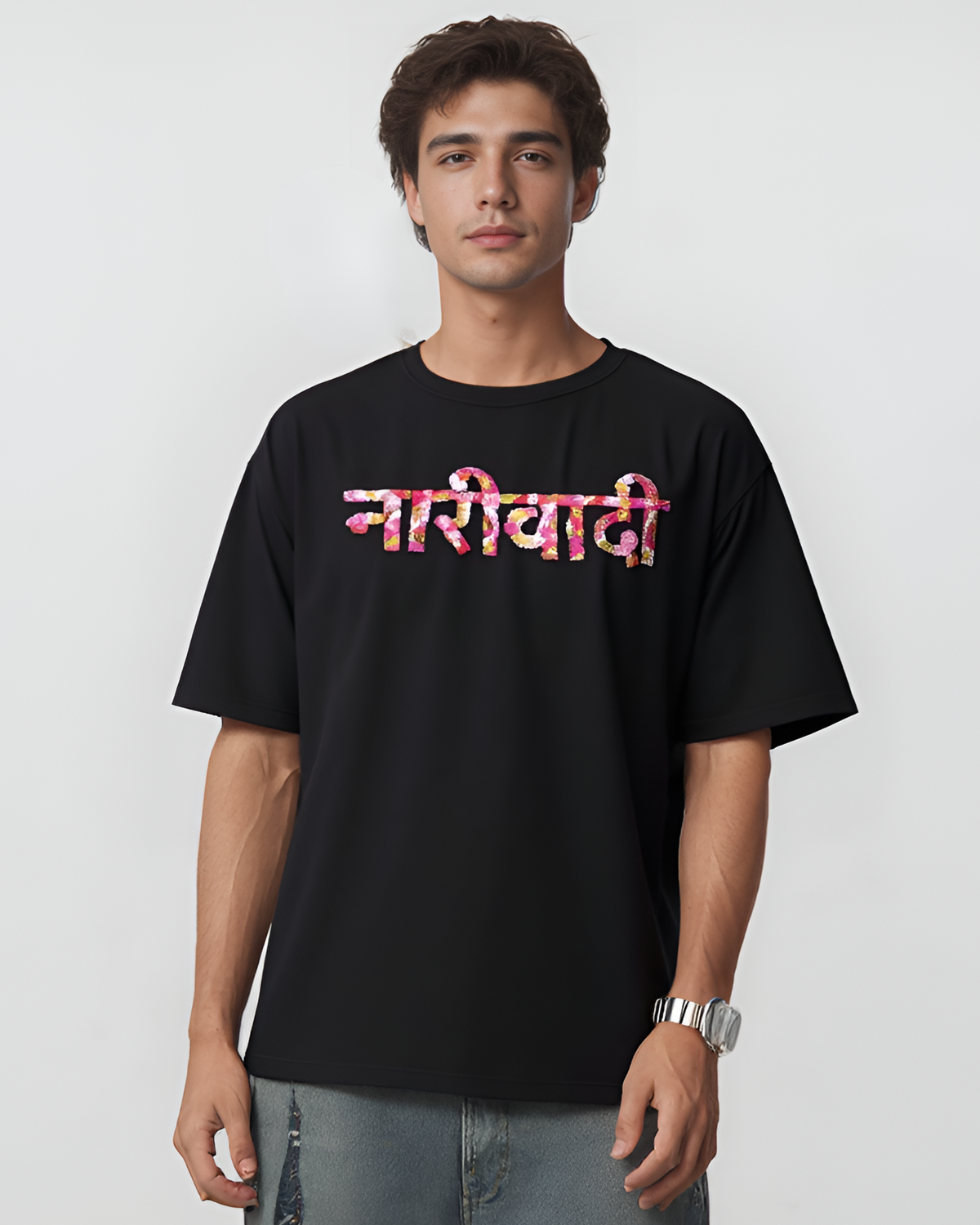 Hindi name hand-embroidered in Devanagari script on a black oversized cotton tee