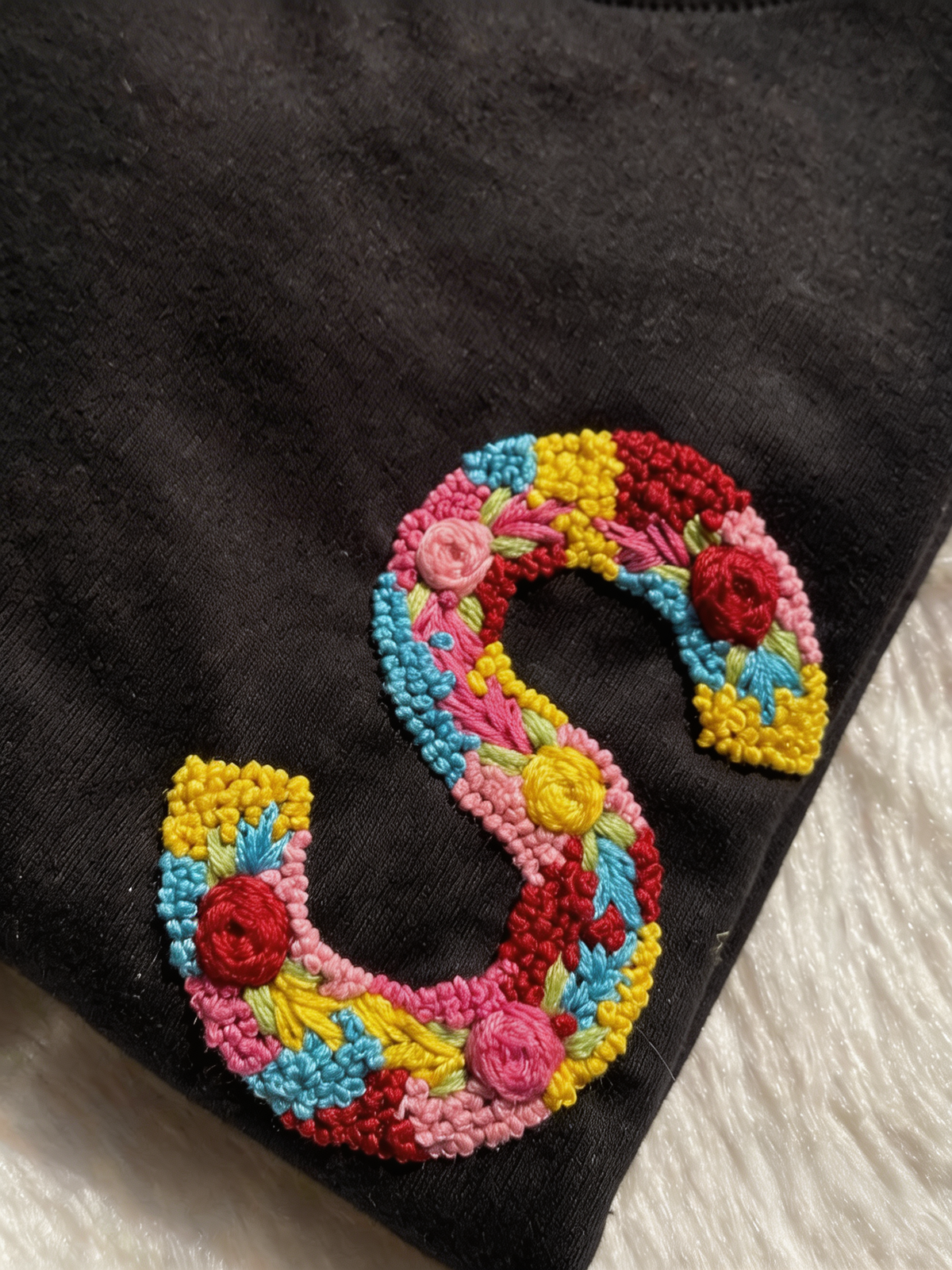 Letter and name embroidery designs - custom initials hand-stitched in real thread on a cotton tee