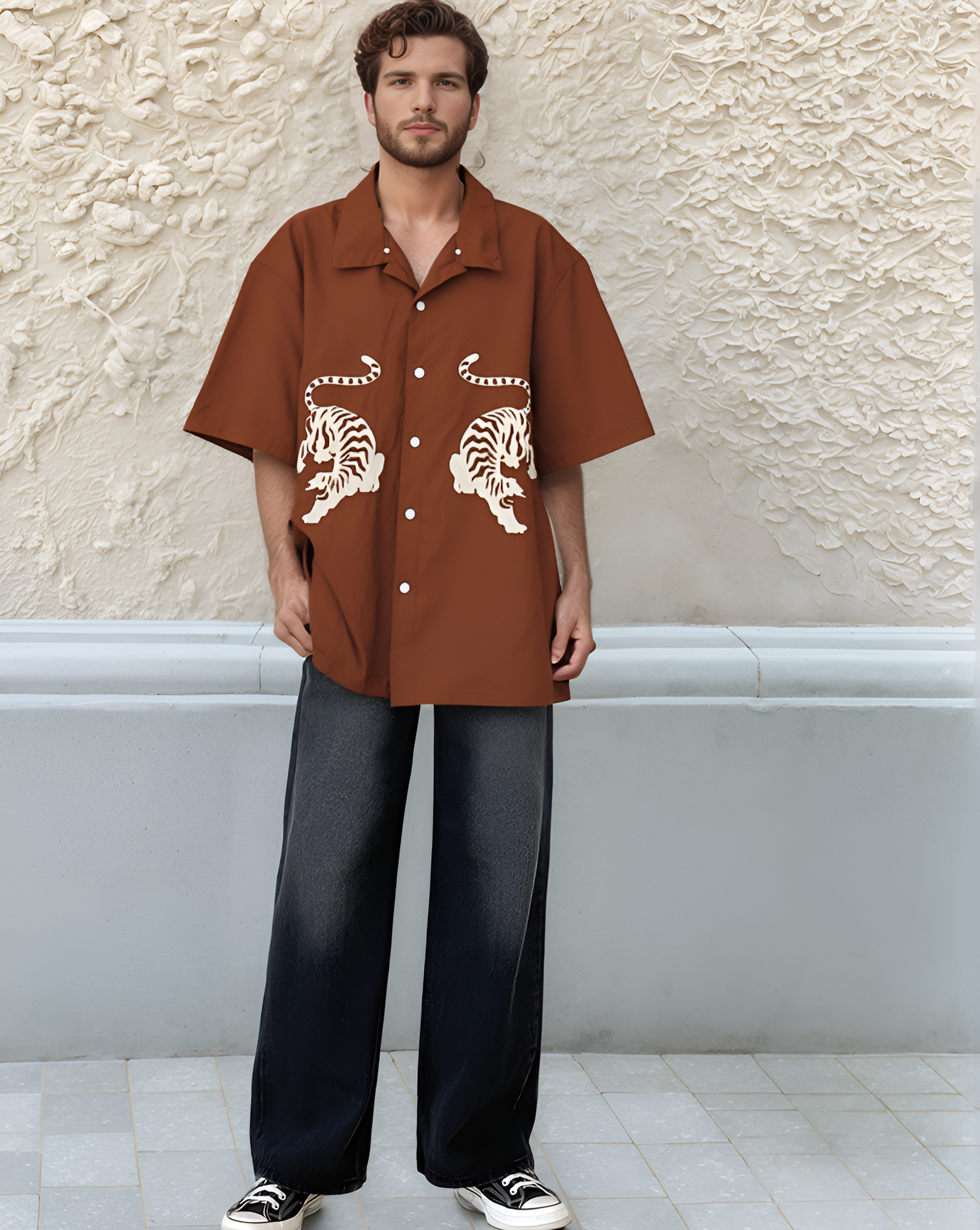 ust brown hand-embroidered men's shirt with Royal Bengal tiger design – sustainable artisan-made shirt styled with white pants, perfect for modern ethical fashion lovers.