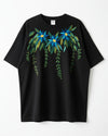 Black t-shirt with hand embroidered floral design on a white background