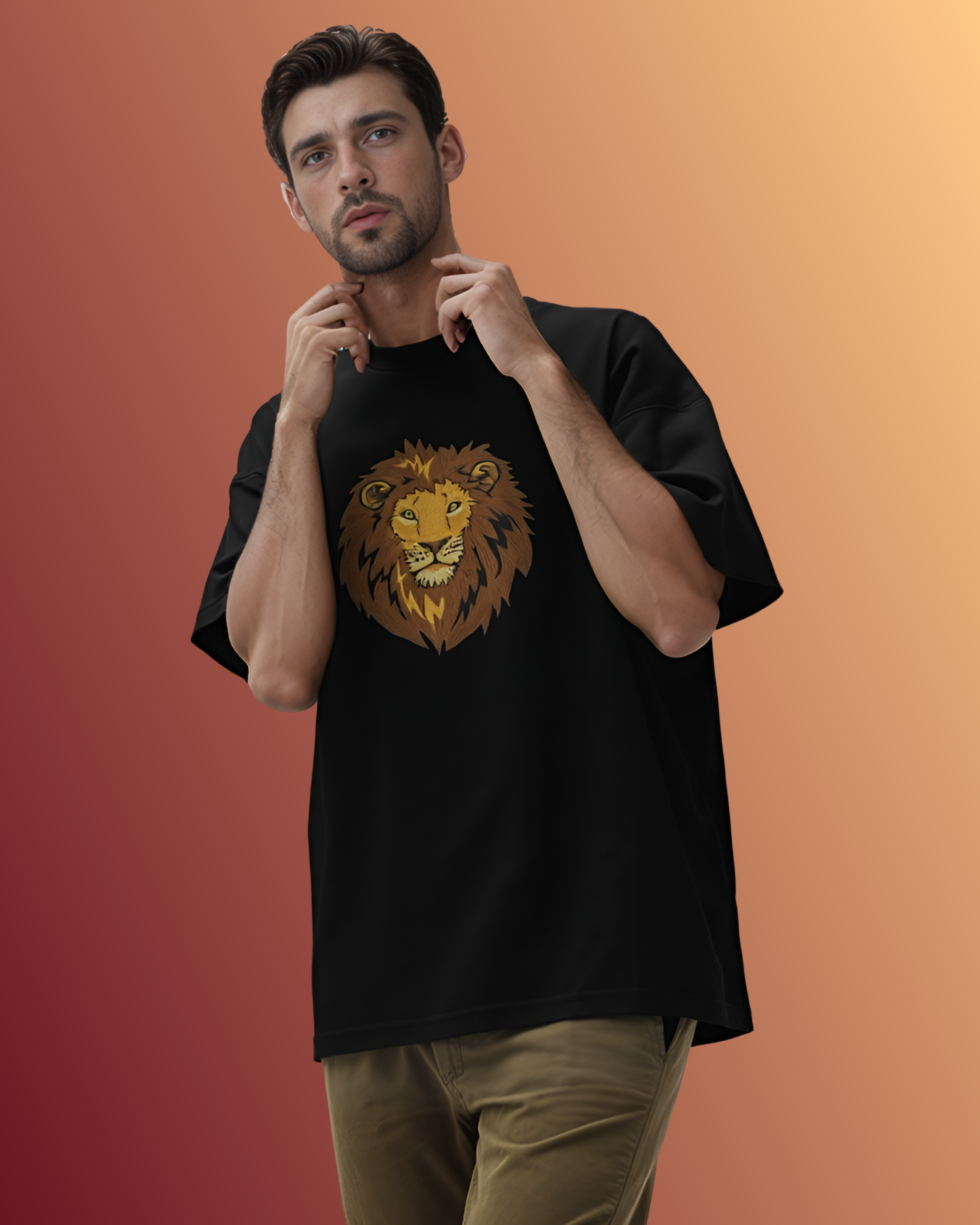 Model wearing black oversized t-shirt with hand embroidered lion design, made from 240 GSM cotton – unisex streetwear fashion.
