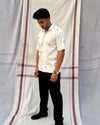 white hand embroidered shirt with mirror work for men, made from cotton with Cuban collar and relaxed fit – Indian artisanal clothing