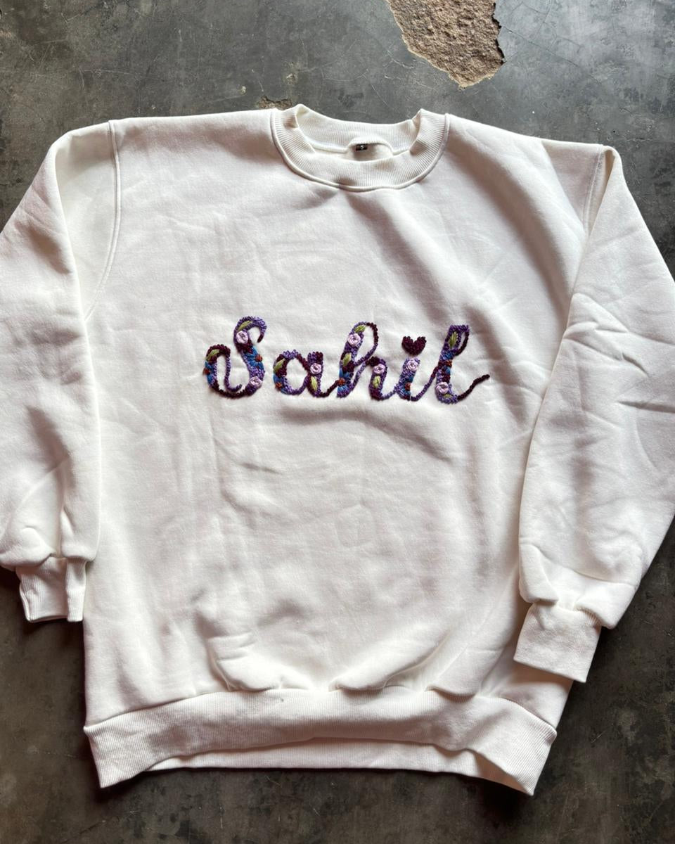 customised name  embroidered hoodies flatlay