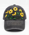 Gray cap with yellow sunflower embroidery on a white background