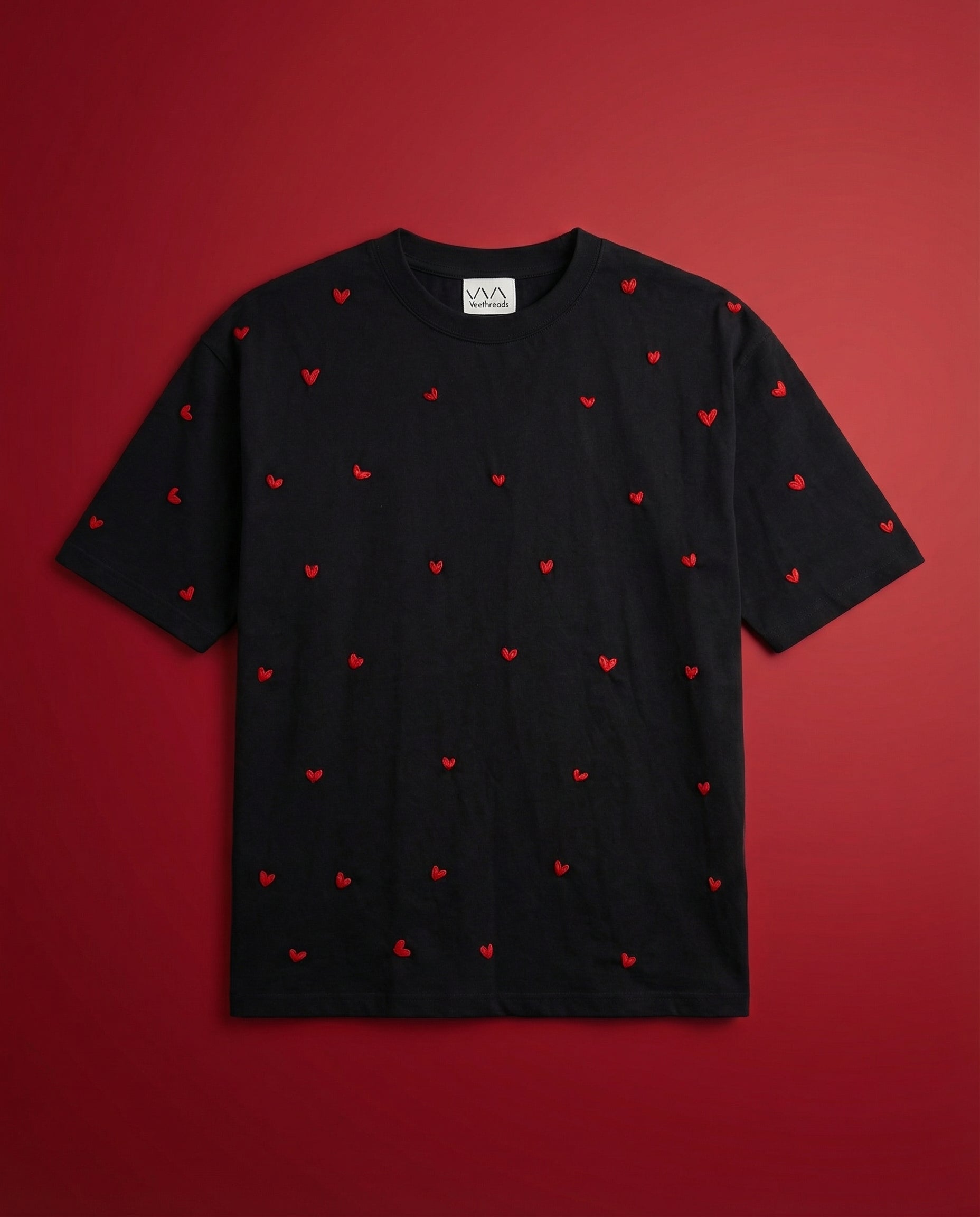 Black t-shirt with red heart shirt
white shirt with red heart on a red background