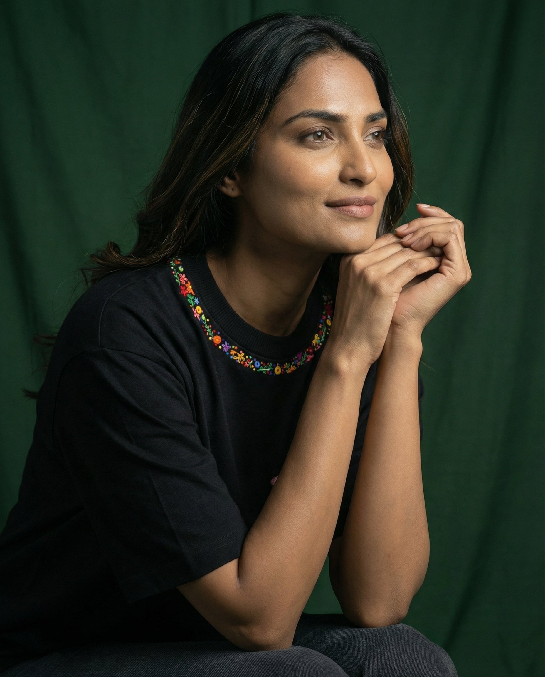 Floral embroidery designs neckline — cotton tee with hand-stitched blossoms along the collar, unisex fit