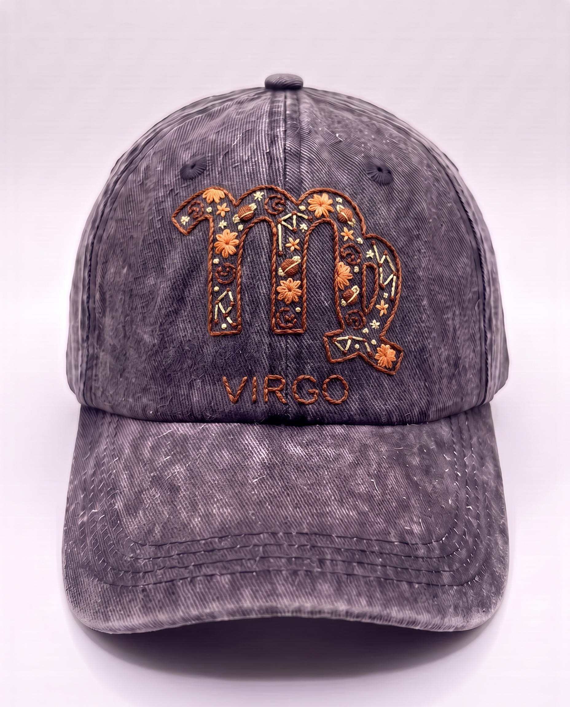 Hand-embroidered Virgo star sign cap in rust brown thread on washed denim