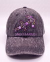 Sagittarius zodiac cap, purple arrow glyph hand-embroidered on charcoal acid-wash denim