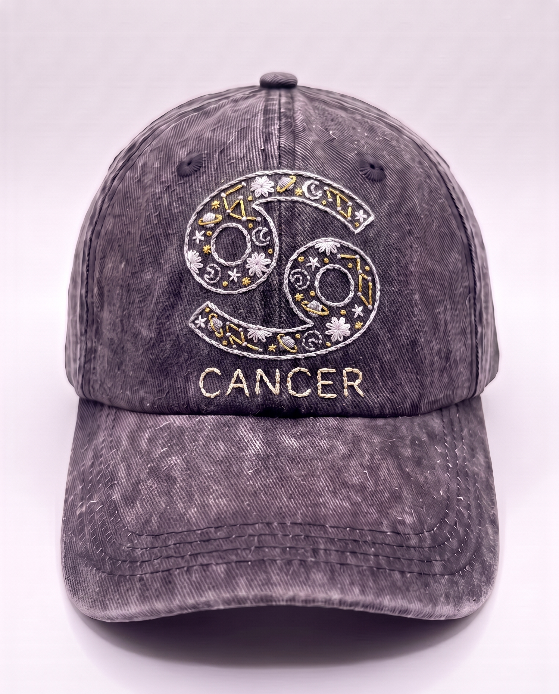 Cancer zodiac cap, silver crab glyph hand-embroidered with gold stars on acid-wash denim