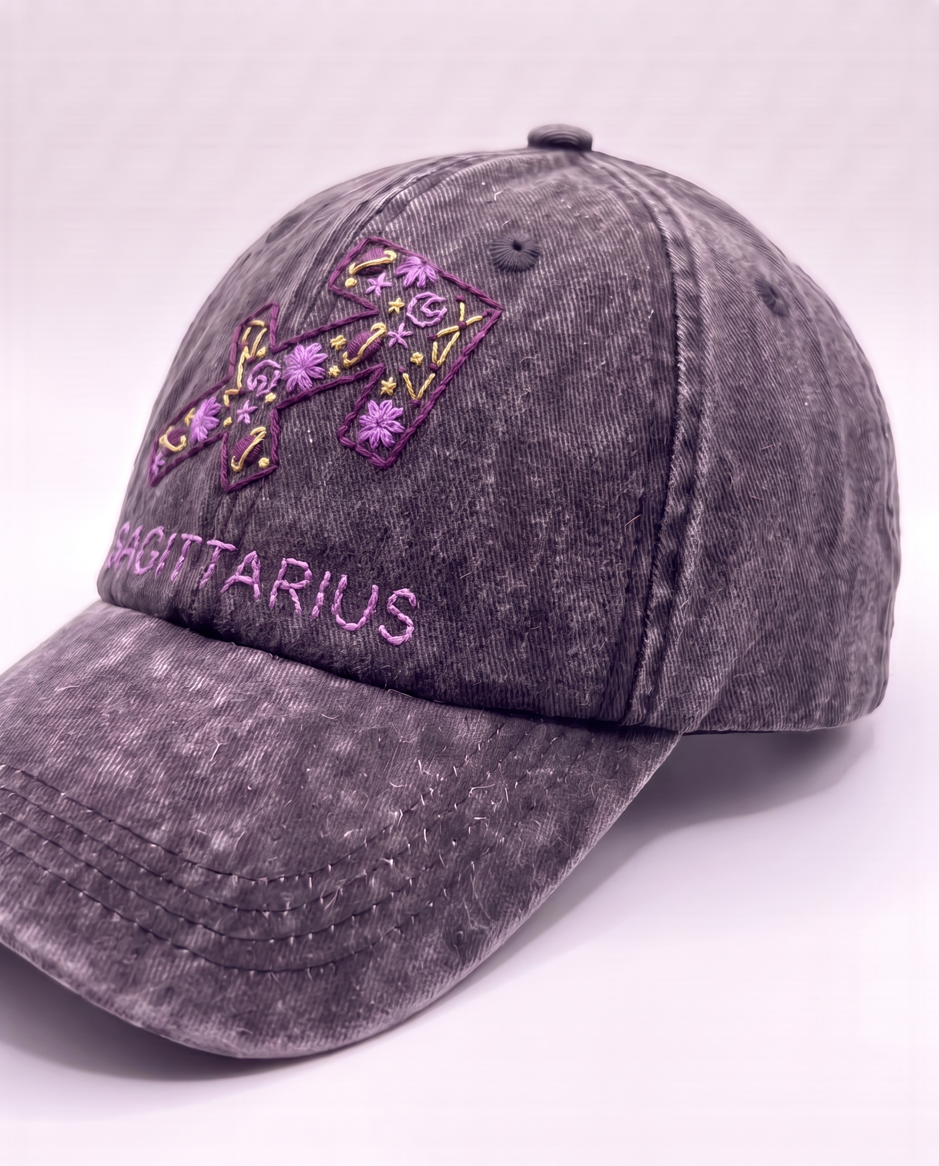 Sagittarius zodiac embroidered cap by Vee Threads, deep purple and lilac thread on washed denim