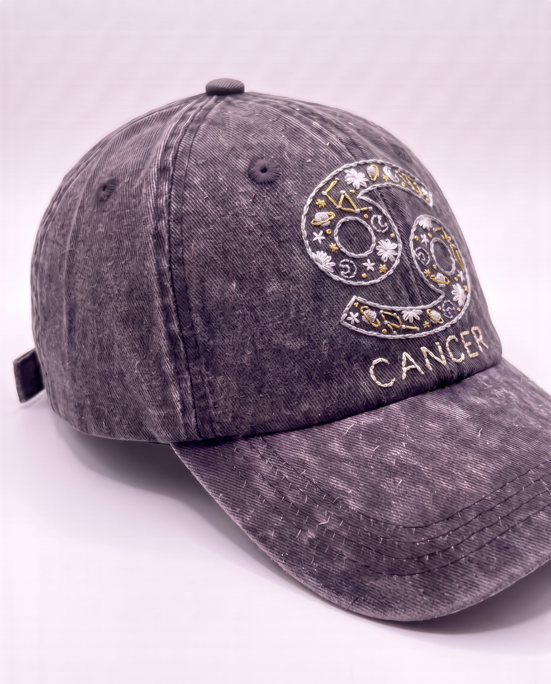 Cancer zodiac cap from the Vee Threads all signs range, silver crab glyph on acid-wash denim
