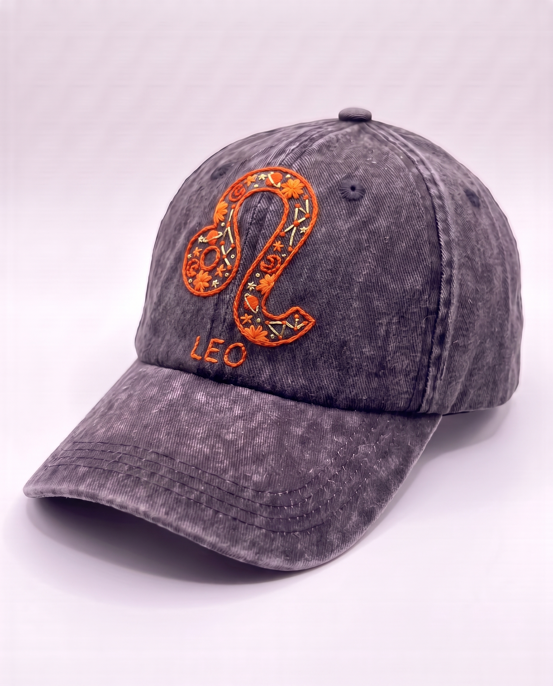 Leo zodiac embroidered cap by Vee Threads, burnt orange and gold thread on washed denim